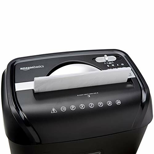 Amazon Basics paper shredder with inserted paper