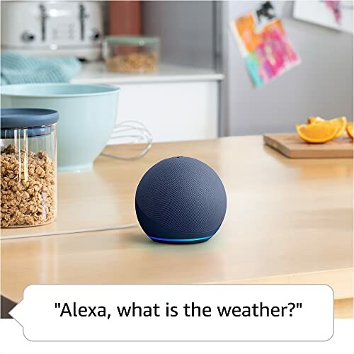 Smart speaker on kitchen counter with voice command asking about the weather.