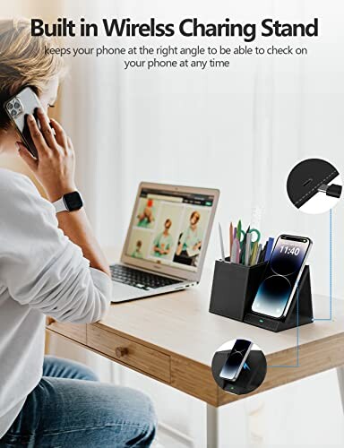 Person using a wireless charging stand while working at a desk.